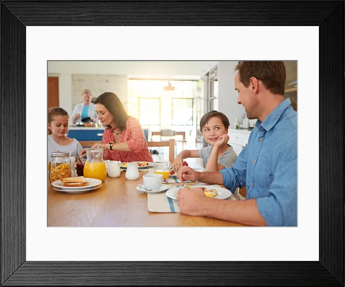 Framed Print : Food, love and morning with a family in the dining room of their home together for health or nutrition