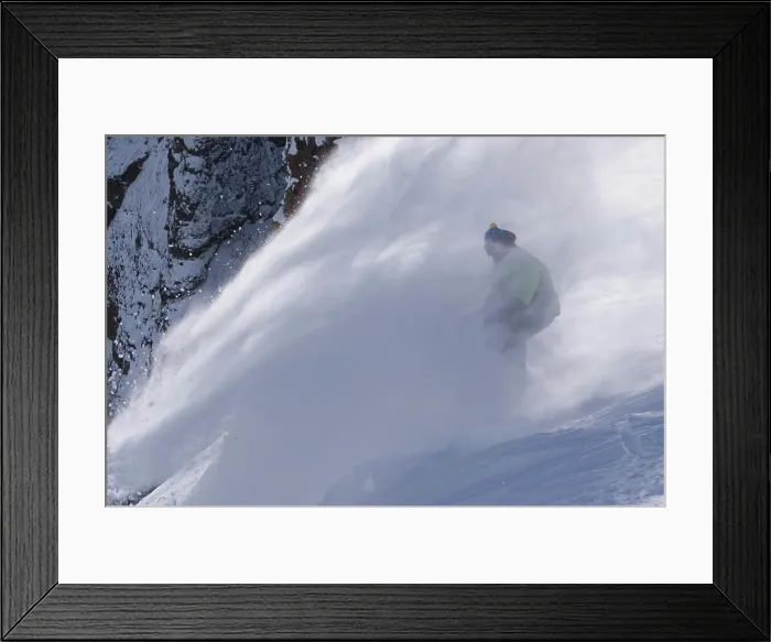 Framed Print : A man snowboarding powder snow on a windy day at Kirkwood ski resort in California Framed Print : A man snowboarding powder snow on a windy day at Kirkwood ski resort in California