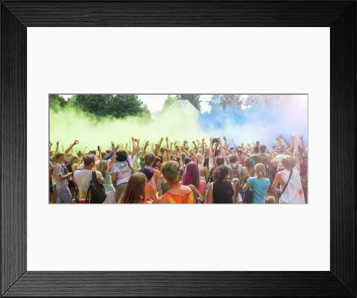 Framed Print : Holi Festival celebration Celebrants dancing during the color Holi Festival Framed Print : Holi Festival celebration Celebrants dancing during the color Holi Festival