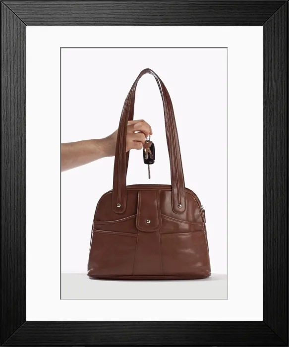 Framed Print : Detail of a man taking keys out of a handbag Framed Print : Detail of a man taking keys out of a handbag