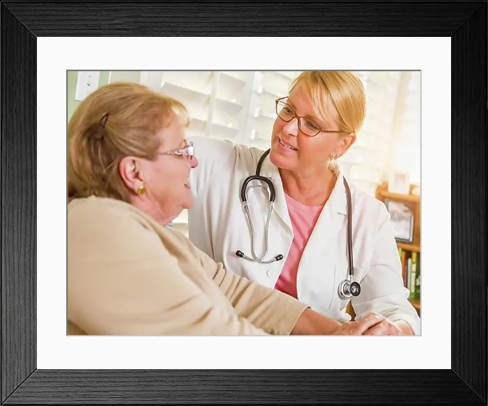 Framed Print : Happy smiling doctor or nurse talking to senior woman in chair at home Framed Print : Happy smiling doctor or nurse talking to senior woman in chair at home