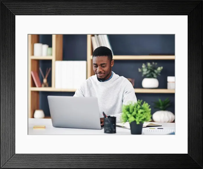 Framed Print : Black man, smile and laptop in office for web design Framed Print : Black man, smile and laptop in office for web design