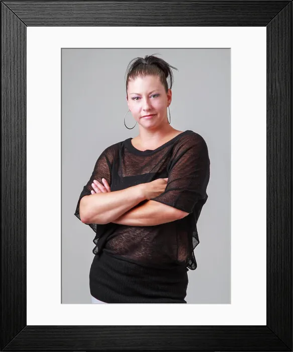 Framed Print : Arm cross and tough Woman in her mid-thirties with her arms cross