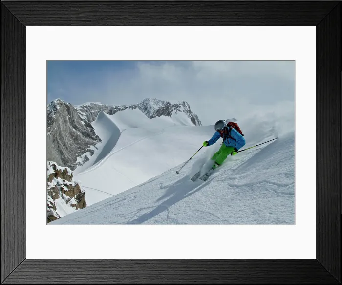 Framed Print : Young male skier skis untracked powder at Chatter Creek Catskiing, near Golden, BC, Canada
