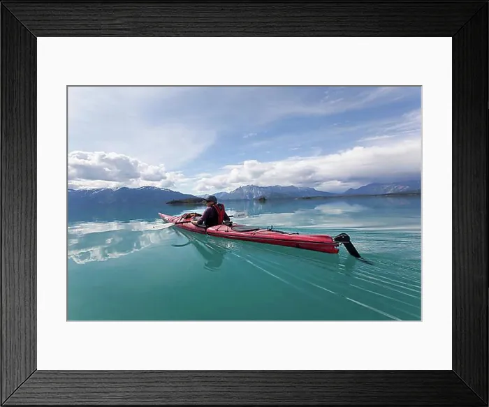 Framed Print : Young woman in a sea kayak, paddling Framed Print : Young woman in a sea kayak, paddling