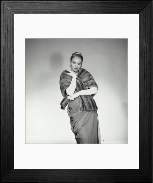 Framed Print : Studio portrait of young woman Framed Print : Studio portrait of young woman