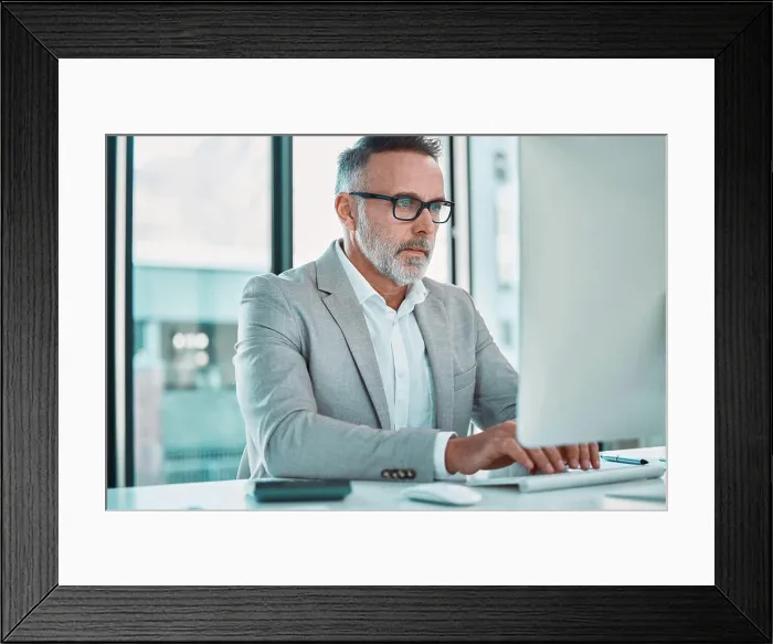 Framed Print : Office, computer and mature man with budget planning