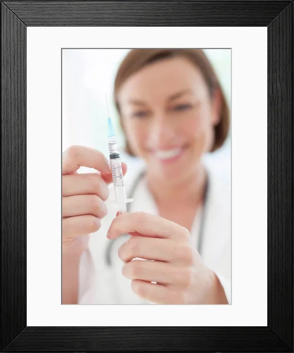 Framed Print : MODEL RELEASED. Doctor preparing injection Framed Print : MODEL RELEASED. Doctor preparing injection