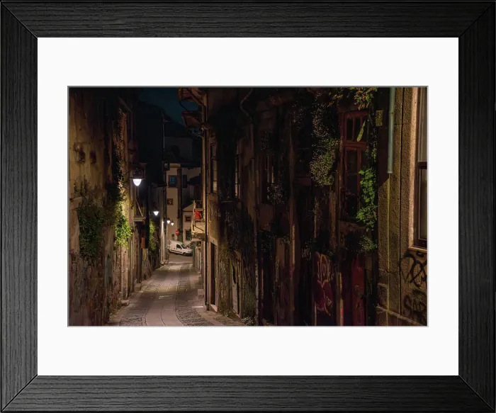 Framed Print : A tight cobblestone alley in the city center of Porto Framed Print : A tight cobblestone alley in the city center of Porto