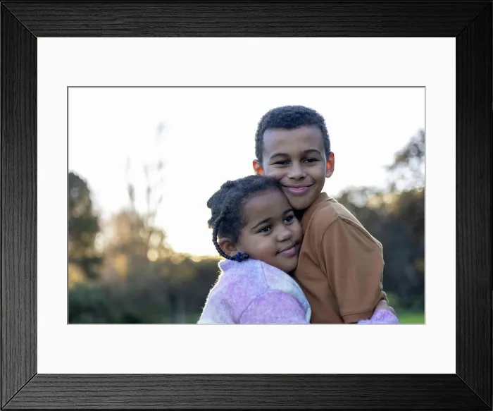 Framed Print : Brother and Sister hugging lovingly Framed Print : Brother and Sister hugging lovingly