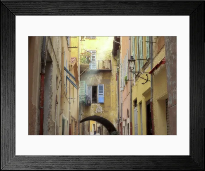 Framed Print : Person in an alley between houses, Villefranche-Sur-Mer, France Framed Print : Person in an alley between houses, Villefranche-Sur-Mer, France