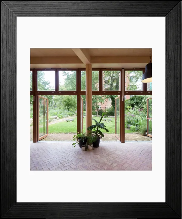 Framed Print : Interior view looking out to garden