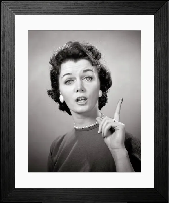 Framed Print : 1950s 1960s BRUNETTE WOMAN PEARL STRAND EARRINGS POINTING FINGER UP SPEAKING TALKING LOOKING AT CAMERA LECTURE TEACH NAG Framed Print : 1950s 1960s BRUNETTE WOMAN PEARL STRAND EARRINGS POINTING FINGER UP SPEAKING TALKING LOOKING AT CAMERA LECTURE TEACH NAG