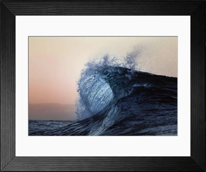 Framed Print : Small wave breaking during sunrise