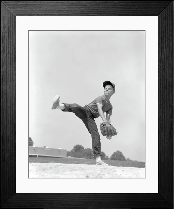 Framed Print : 1960S Boy Wearing Baseball Cap Tee Shirt Blue Jeans And Determined Expression In Wind-Up To Deliver Pitch Framed Print : 1960S Boy Wearing Baseball Cap Tee Shirt Blue Jeans And Determined Expression In Wind-Up To Deliver Pitch