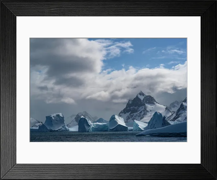 Framed Print : South Georgia Island. sculpted blue icebergs floating in the Atlantic and mountain scenery Framed Print : South Georgia Island. sculpted blue icebergs floating in the Atlantic and mountain scenery