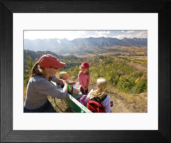 Framed Print : Woman with daughters relax on bench during hiking on Castle Mountain Trail in autumn, Fernie, BC, Canada Framed Print : Woman with daughters relax on bench during hiking on Castle Mountain Trail in autumn, Fernie, BC, Canada