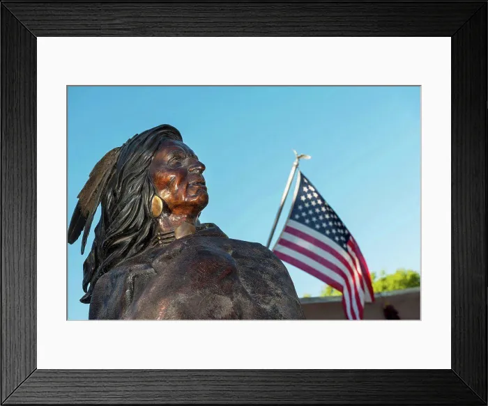 Framed Print : Native American Indian Bronze Statue Next To An American Flag At Friday Night Canyon Road Gallery Walk In Santa Fe Framed Print : Native American Indian Bronze Statue Next To An American Flag At Friday Night Canyon Road Gallery Walk In Santa Fe