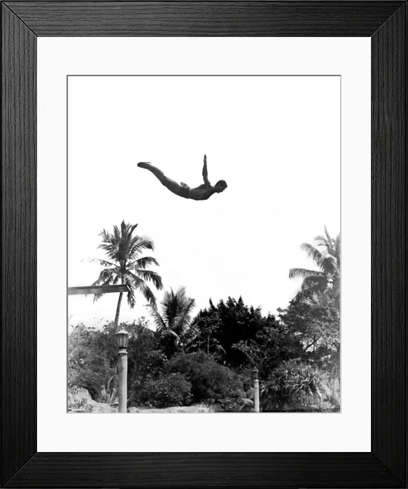 Framed Print : 1940S Man Poised Midair Arms Out Jumping From Diving Board Into Pool Framed Print : 1940S Man Poised Midair Arms Out Jumping From Diving Board Into Pool