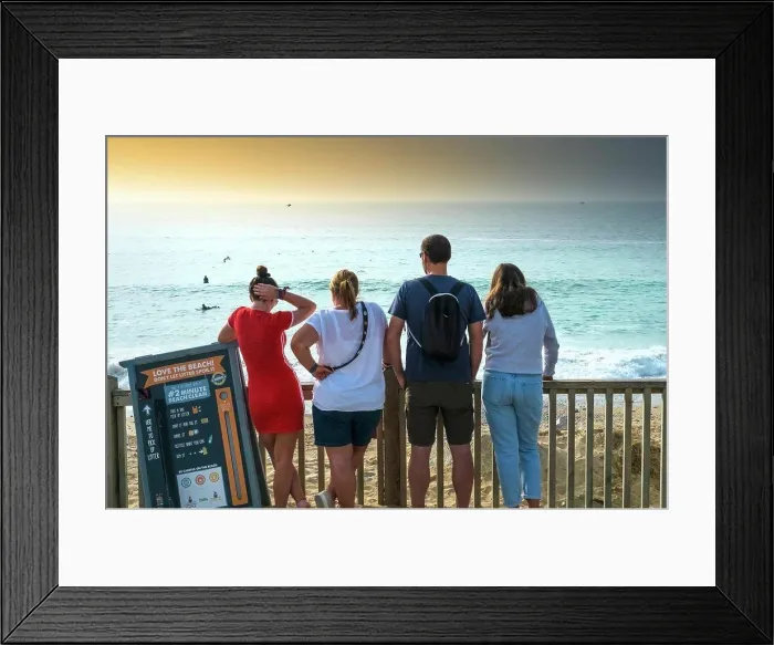 Framed Print : Holidaymakers standing looking out over Fistral Beach in Newquay in Cornwall Framed Print : Holidaymakers standing looking out over Fistral Beach in Newquay in Cornwall