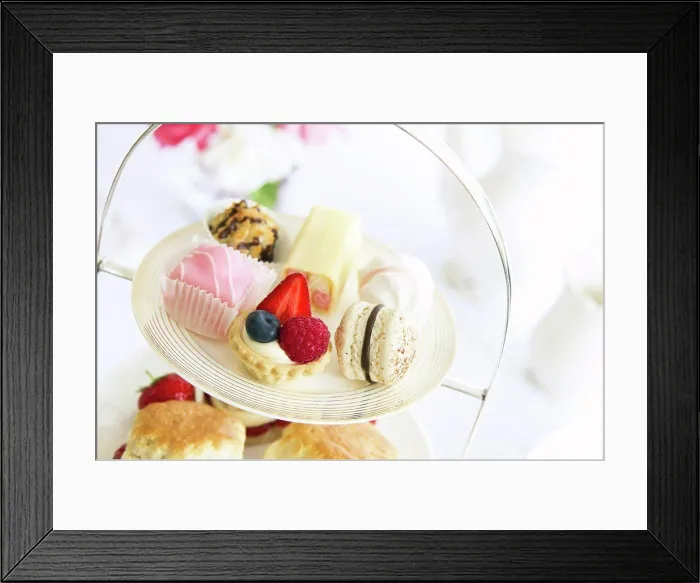 Framed Print : Afternoon tea served with an assortment of cakes Framed Print : Afternoon tea served with an assortment of cakes