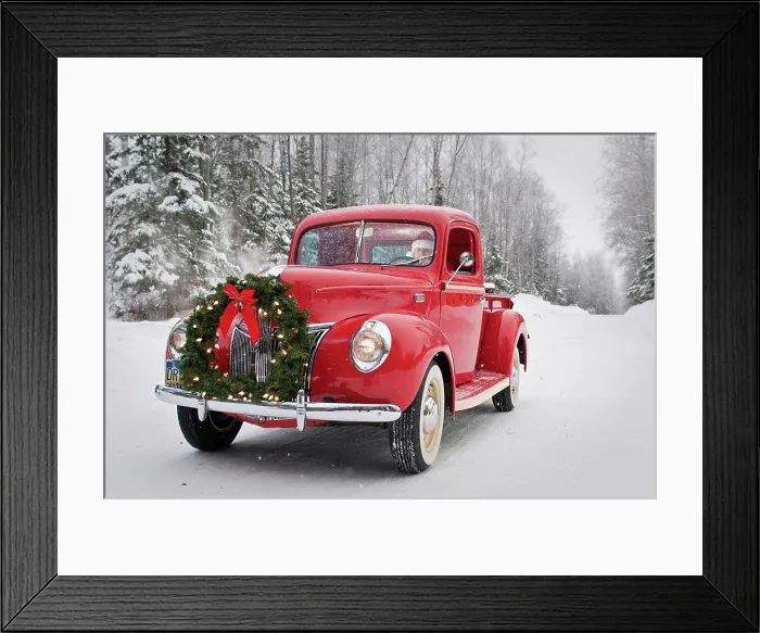 Framed Print : Man driving a vintage 1941 Ford pickup with a Christmas wreath on the front during Winter in Southcentral, Alaska