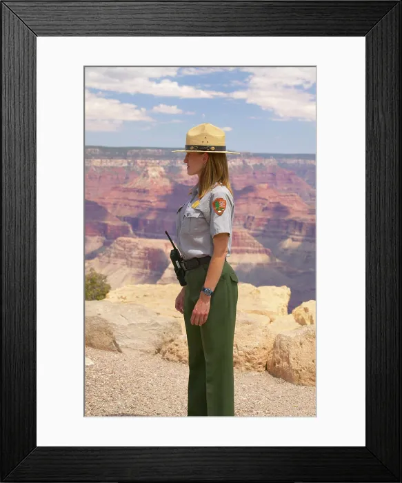 Framed Print : Female National Park ranger looking at South Rim of Grand Canyon National Park in mid-summer in Arizona Framed Print : Female National Park ranger looking at South Rim of Grand Canyon National Park in mid-summer in Arizona