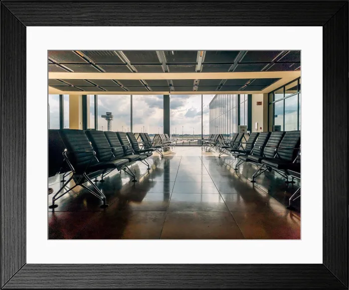 Framed Print : Empty airport departure area lounge on the background of the window Framed Print : Empty airport departure area lounge on the background of the window