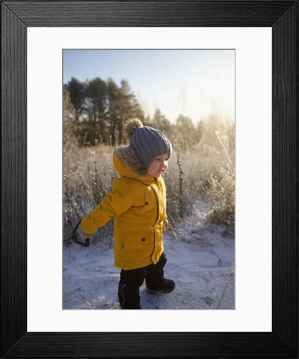 Framed Print : Boy walking in the park on a winter morning Framed Print : Boy walking in the park on a winter morning