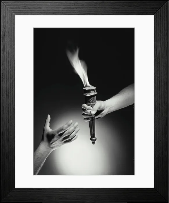 Framed Print : Vintage Photograph. Hand passing torch with flame to hand reaching up from bottom of frame with dark background, Frame 4 Framed Print : Vintage Photograph. Hand passing torch with flame to hand reaching up from bottom of frame with dark background, Frame 4