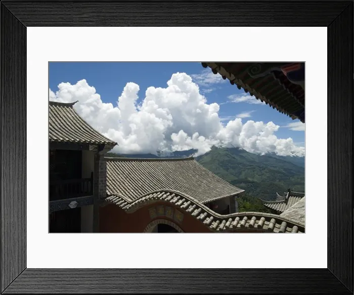 Framed Print : Undulating roof tiles outline the 270-year-old Meng Long Landlord's Home Framed Print : Undulating roof tiles outline the 270-year-old Meng Long Landlord's Home