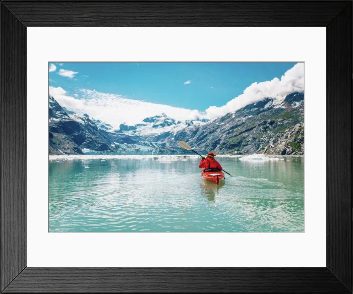 Framed Print : Woman kayaking in Glacier Bay National Park with glacier in background Framed Print : Woman kayaking in Glacier Bay National Park with glacier in background