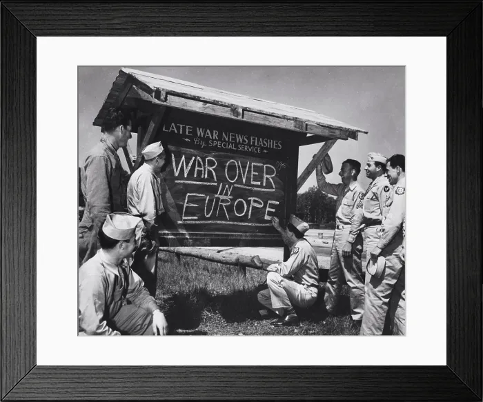 Framed Print : An Army private is shown breaking the news of the end of the war in Europe to other Soldiers after receiving an Framed Print : An Army private is shown breaking the news of the end of the war in Europe to other Soldiers after receiving an