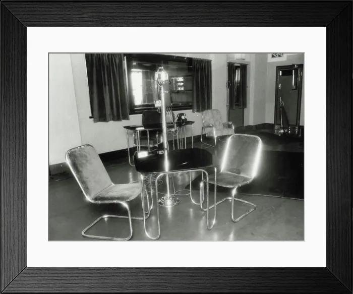Framed Print : Modern appointments at 2UW's new studio in the state shopping block to the opened tonight steel furniture has pride of