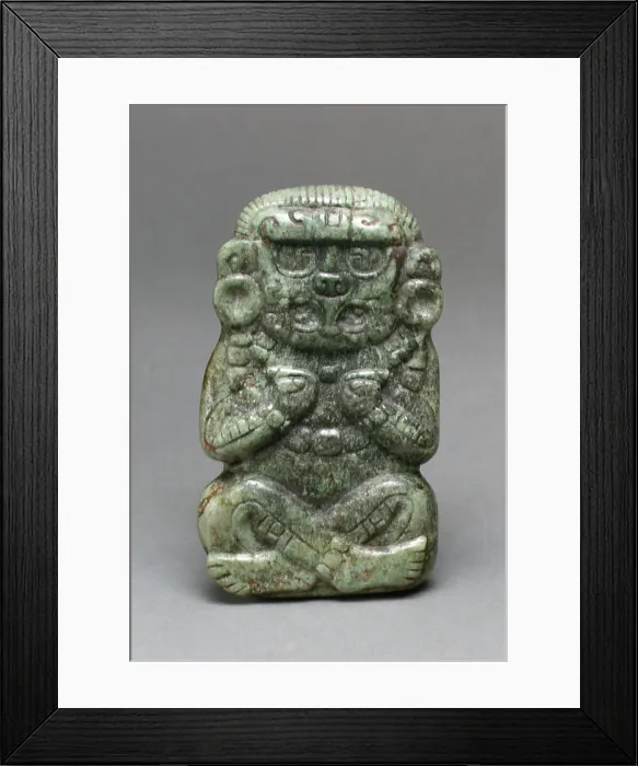 Framed Print : Deity Figure 3rd-6th century Maya This jade figurine depicts a cross-legged figure with his arms bent in toward his