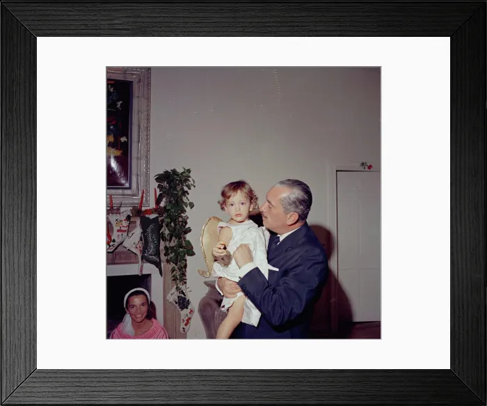 Framed Print : Christmas Day, Palm Beach. Prince Stanislaus Radziwill of Poland holds his daughter