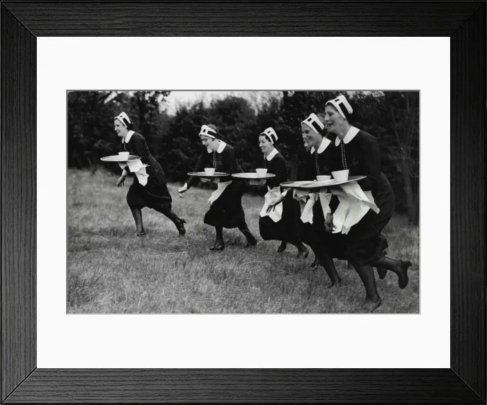 Framed Print : Sports Carnival At Sudbury.Waitresses carrying plays during the 'Nippies' race. August 30, 1937. (Photo by Keystone) Framed Print : Sports Carnival At Sudbury.Waitresses carrying plays during the 'Nippies' race. August 30, 1937. (Photo by Keystone)