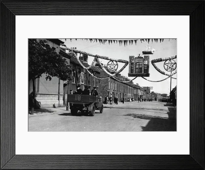 Framed Print : The Belfast Riots; Troops Called Out -- A police truck passing under the welcoming sign of the 12th July Orange Day Framed Print : The Belfast Riots; Troops Called Out -- A police truck passing under the welcoming sign of the 12th July Orange Day