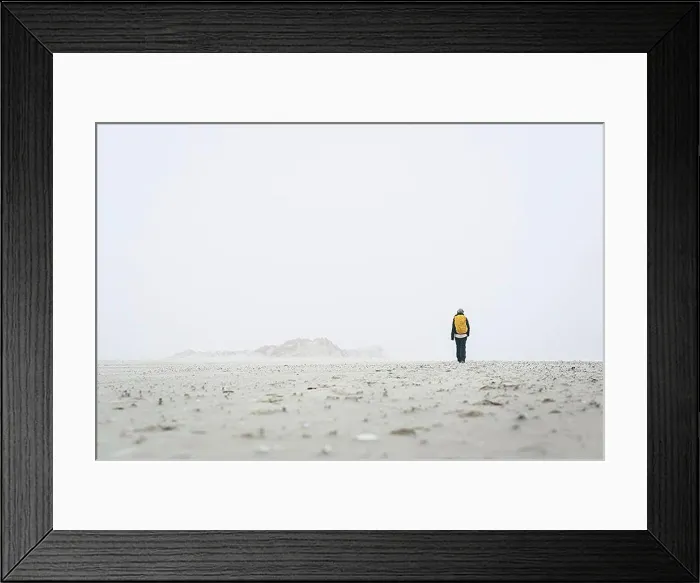 Framed Print : Rear view of female hiker walking on field against sky in foggy weather Framed Print : Rear view of female hiker walking on field against sky in foggy weather