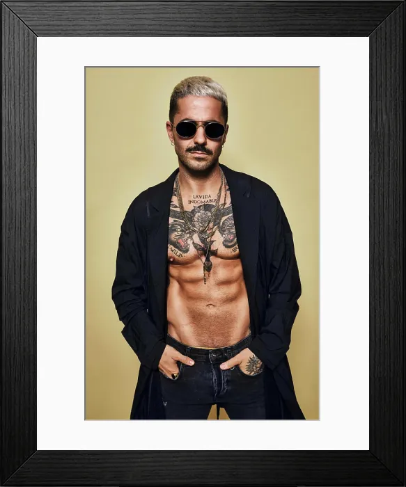 Framed Print : Brutal muscular sexy fit male with tattooed torso wearing black coat