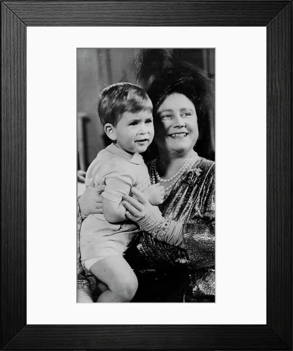 Framed Print : 1950... The young Prince with Elizabeth now the Queen Mother. November 11, 1950. (Photo by The Associated Press Ltd.).