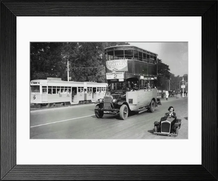 Framed Print : The World's Smallest Car In Calcutta -- There totally different vehicles seen in a Calcutta (India) street recently