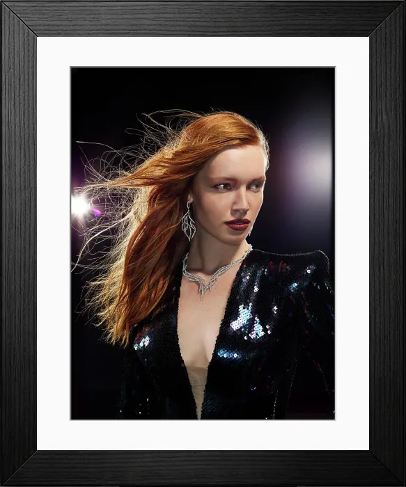 Framed Print : Portrait of a woman with light flares and wind Framed Print : Portrait of a woman with light flares and wind