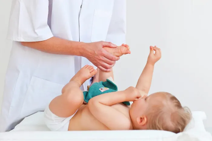 Framed Print : 17 months old baby receiving foot massage Framed Print : 17 months old baby receiving foot massage