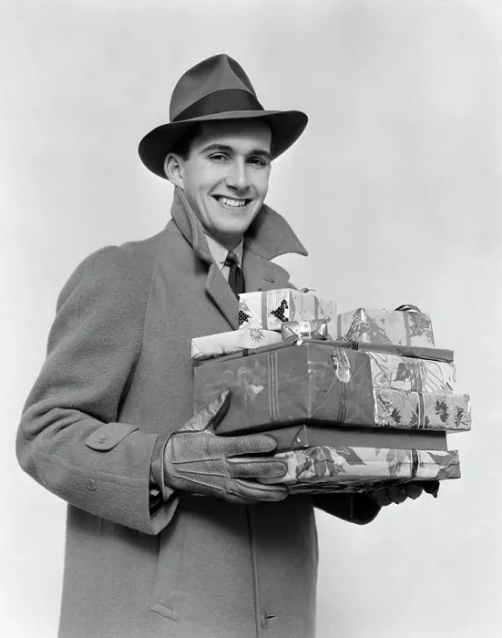 Framed Print : 1930S 1940S Man In Winter Coat Hat And Gloves Holding Pile Of Wrapped Christmas Presents Smiling Framed Print : 1930S 1940S Man In Winter Coat Hat And Gloves Holding Pile Of Wrapped Christmas Presents Smiling