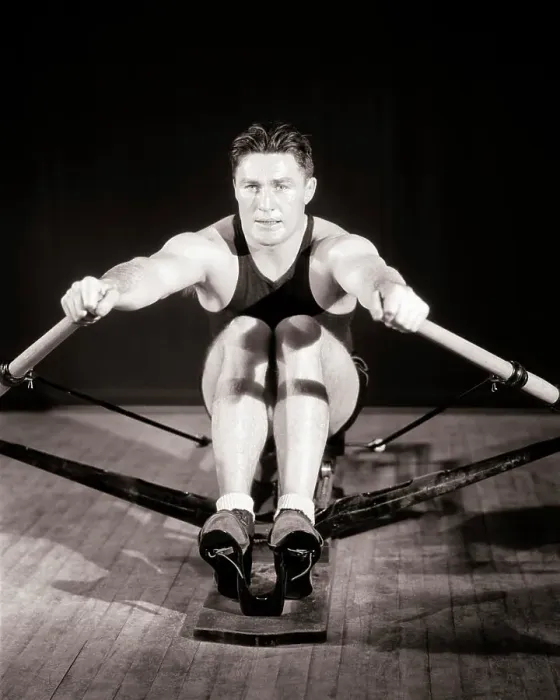 Framed Print : 1930s MAN MUSCULAR ATHLETE CONCENTRATED FOCUSED FACIAL EXPRESSION EXERCISING WORKING OUT ON GYMNASIUM STATIONARY ROWING Framed Print : 1930s MAN MUSCULAR ATHLETE CONCENTRATED FOCUSED FACIAL EXPRESSION EXERCISING WORKING OUT ON GYMNASIUM STATIONARY ROWING