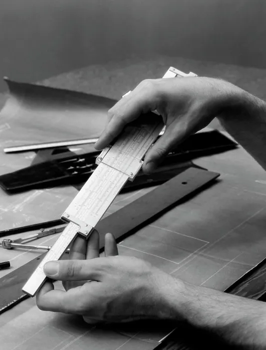 Framed Print : 1930S Man'S Hands Using Slide Rule Over Drafting Table Framed Print : 1930S Man'S Hands Using Slide Rule Over Drafting Table