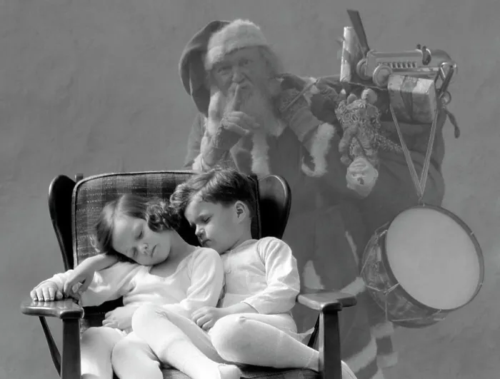 Framed Print : 1930S Santa Claus Finger To Lips Sack Of Christmas Toy Presents Over Shoulder Ghost Behind Boy And Girl Asleep In Chair Framed Print : 1930S Santa Claus Finger To Lips Sack Of Christmas Toy Presents Over Shoulder Ghost Behind Boy And Girl Asleep In Chair