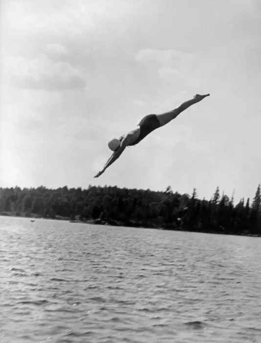 Framed Print : 1930S Woman Diving Into Lake