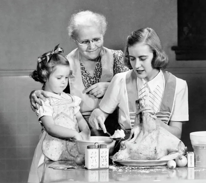 Framed Print : 1940s 1950s MOTHER DAUGHTER GRANDMOTHER STUFFING THANKSGIVING TURKEY Framed Print : 1940s 1950s MOTHER DAUGHTER GRANDMOTHER STUFFING THANKSGIVING TURKEY